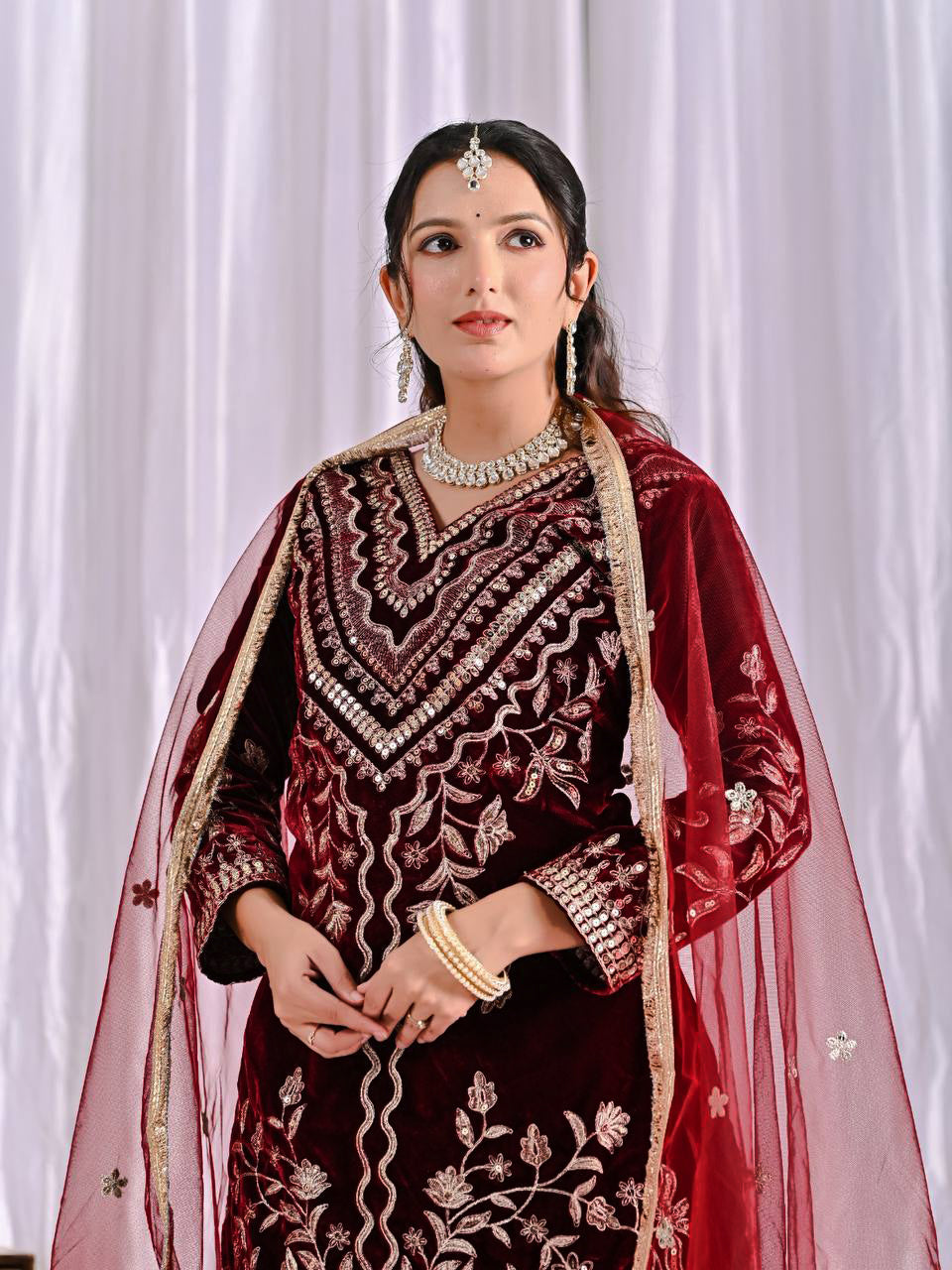 Maroon Luxury Velvet Embroidered Kurta Dhoti Set by AAvaran