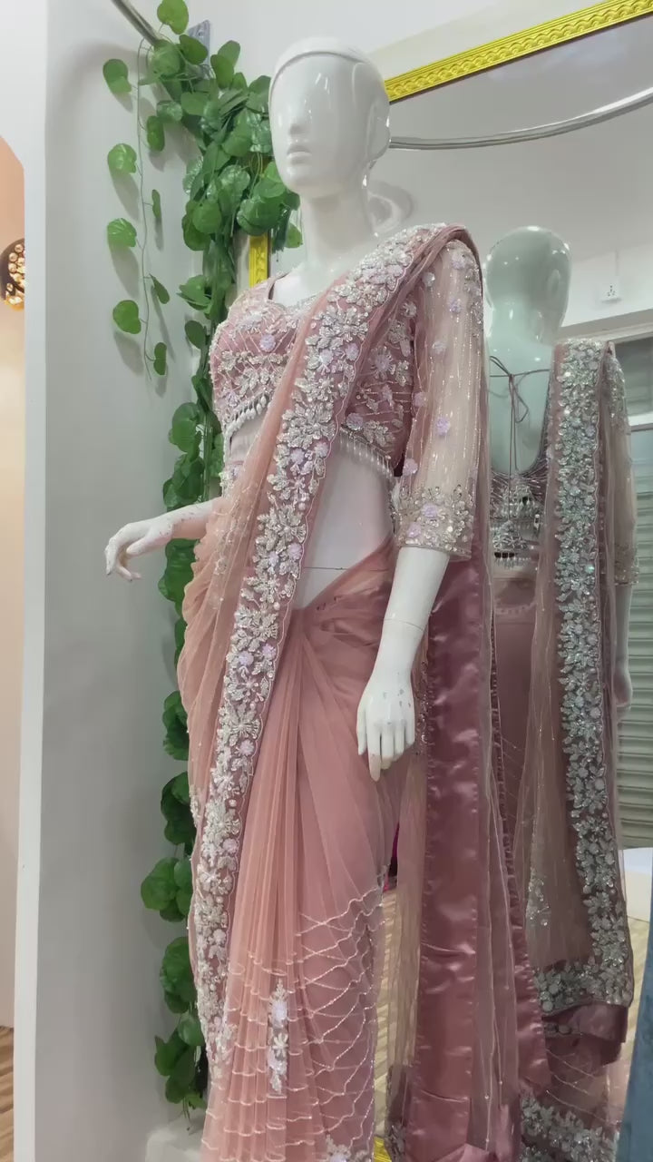 AAvaran Peach Soft Net Saree